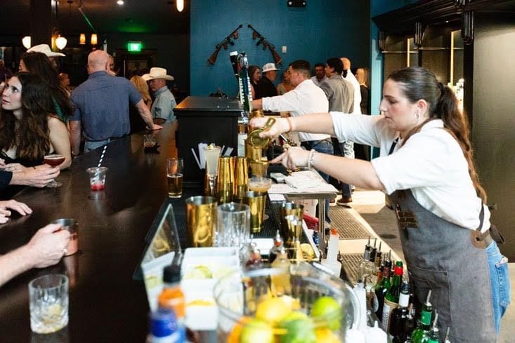 Guests at the WhiskyWoods bar during an event