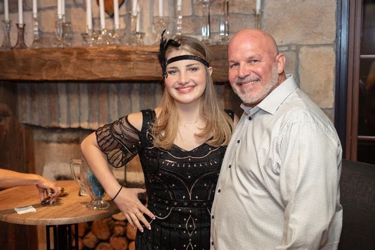 Guests in 1920s attire at the Bootleggers Bash